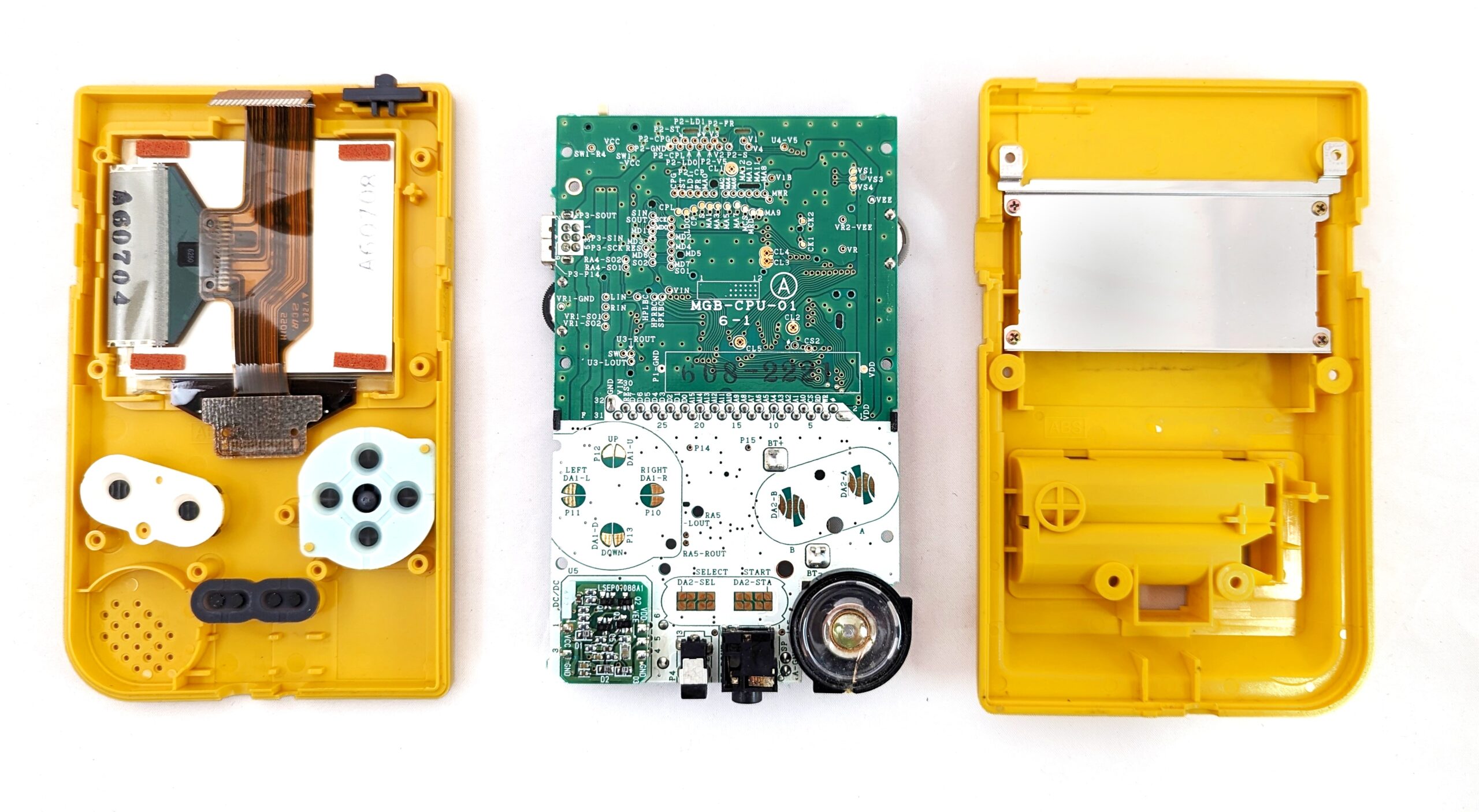 an exploded view of a game boy pocket: front shell, back shell, pcb