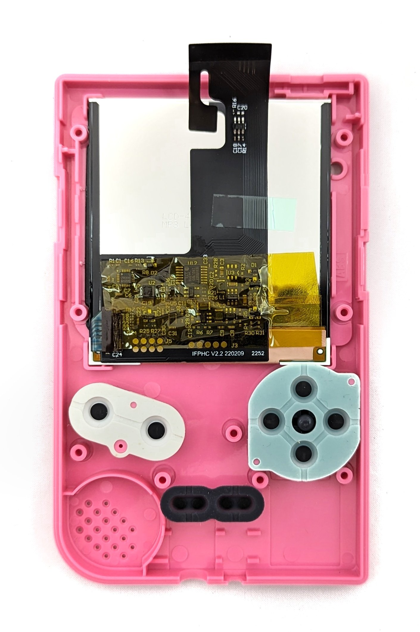 The front shell of a pink GameBoy with buttons and screen inserted.
